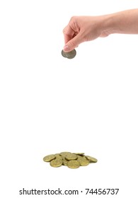 A Female Hand Dropping Coin Isolated Against A White Background