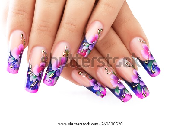 Female hand with\
floral art design nails \
.
