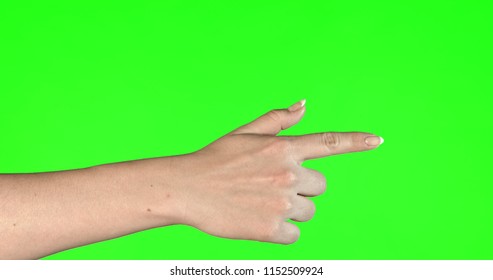 Female hand gestures on green screen: pointing or pressing. - Powered by Shutterstock