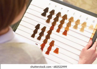 Female Hand, Hair Color Chart. Samples Of Dyed Hair.