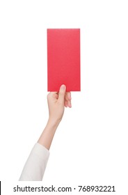 A Female Hand Hold A Chinese Red Envelope On White Background