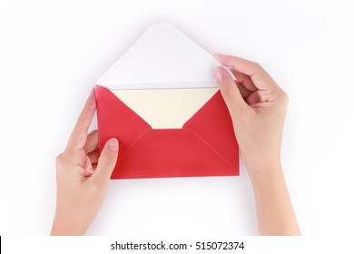 A Female Hand Hold (open) A Envelope And Post Card On White Background 