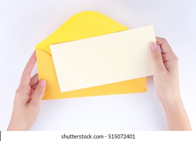 A Female Hand Hold (open) A Envelope And Post Card On White Background 