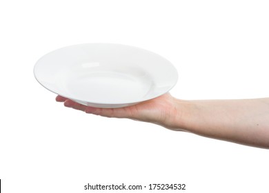 Female Hand Holding Big White Plate Isolated On White Background