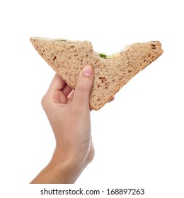 Female Hand Holding Bitten Sandwich Isolated On White