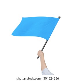 Female Hand Holding Blank Blue Flag, Isolated On White Background.