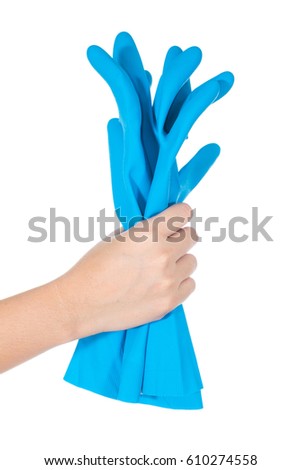 Female hand holding blue glove  isolated on white background