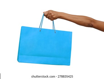 Female Hand Holding Blue Shopping Bag Isolated