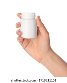 Female Hand Holding Bottle Of Pills On White Background