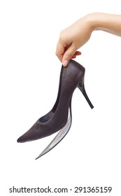 Female Hand Holding Broken High Heel Shoes