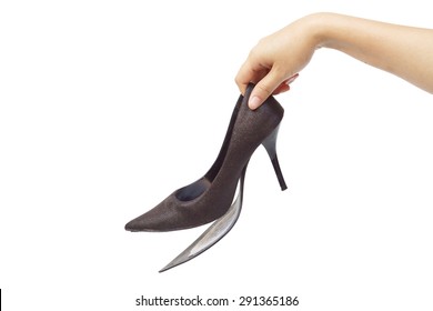 Female Hand Holding Broken High Heel Shoes