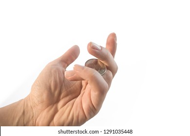 Female Hand Holding Canadian Quarter While Making  Coin Trick