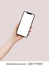 Female hand holding cell phone with blank screen on pink background. Mockup