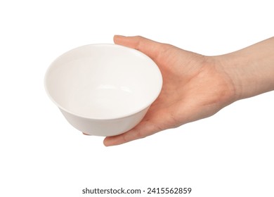 Female hand is holding a ceramic bowl isolated on a white background.  - Powered by Shutterstock