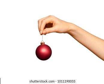 Female Hand Holding Christmas Ball, Isolated On White