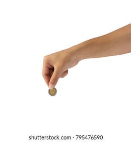 Female Hand Holding Coin Isolated On White Background.