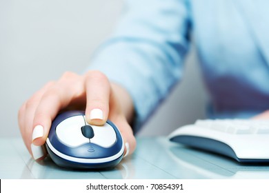 Female Hand Holding Computer Mouse