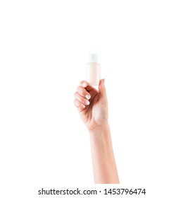 Female Hand Holding Cream Bottle Of Lotion Isolated. Girl Give Tube Cosmetic Products On White Background.