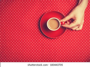 Female Hand Holding Cup Of Coffee.