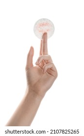 Female Hand Holding Dirty Cotton Pad On White Background