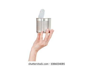 Female hand holding empty tin can. Recyclable waste. Recycling, reuse, garbage disposal, resources, environment and ecology concept