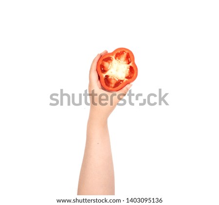   
Female hand holding Fresh juicy peppers on a white background                              