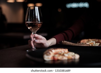 Female Hand Holding Glas Of Fortified Wine