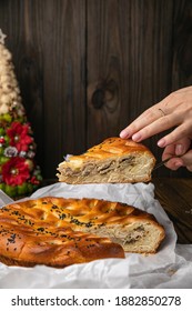 Female Hand Holding A Meat Pie
