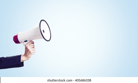 Female Hand Holding A Megaphone 