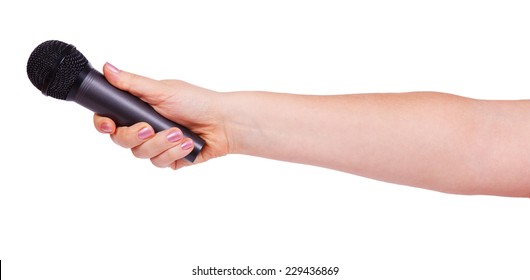 Female Hand Holding A Microphone Isolated On White Background