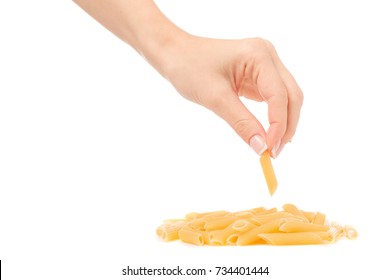 Female hand holding a pasta on a white background isolated