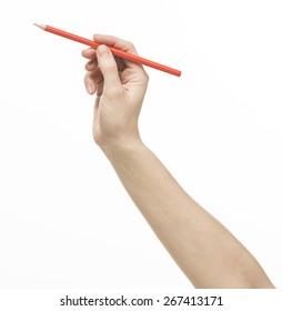 Female Hand Holding A Pencil, Isolated On White