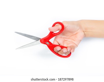 Female Hand Holding Scissors On White Isolated Background.