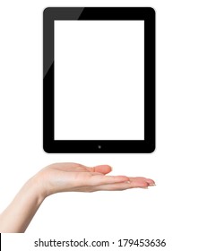 Female Hand Holding And Showing Black Tablet PC Similar To Ipade