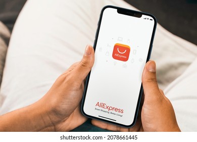 Female Hand Holding A Smartphone With Ali Express App On The Screen. Rio De Janeiro, RJ, Brazil. September 2021.