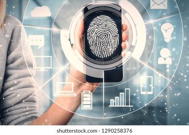 Female Hand Holding Smartphone With Digital Business Interface And Finger Print. Recognition And Id Concept. Double Exposure 