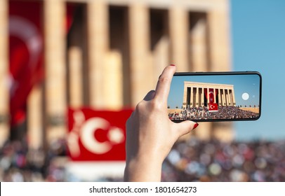 Female Hand Holding Smartphone And Taking Photo Of Anitkabir. Turkish People Showing Respect To The Leader And The Founder Of Turkish Republic In Anitkabir Mausoleum.