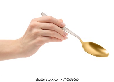 Female Hand Holding A Spoon On A White Background Isolation