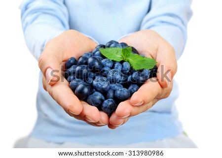 Similar – Hände, die selbstgepflückte Blaubeeren in eine Schüssel sortieren