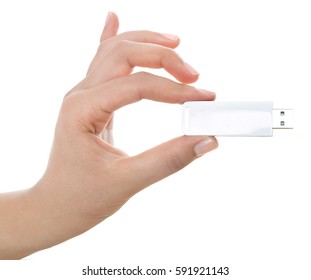 Female Hand Holding Usb Stick Isolated On White