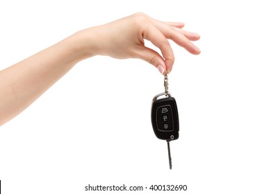 Female Hand Holds Car Keys On White Background.