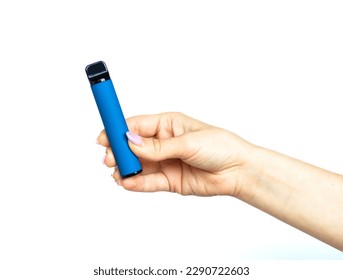  Female hand holds electronic cigarette on a white background. Disposable electronic cigarette. concept of modern smoking, vaping and nicotine. copyspace. Alternative way of smoking vaping device