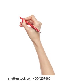 Female Hand Holds Red Pen. Isolated On White Background.