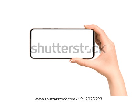 female hand holds a smart phone. front view on isolated white background