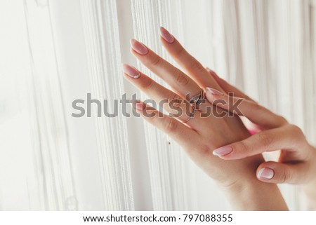 Female hand with jewelry rings