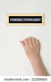 Female Hand Is Knocking On Forensic Pathologist Door For A Medical Exam