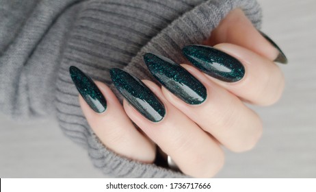 green holds manicure 