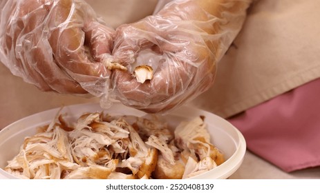 Female Hand Making Ayam Suwir, Freid Breast Chicken Shredded  - Powered by Shutterstock