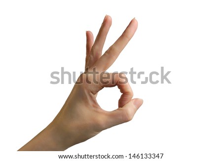 Female hand making Okay or flicking sign