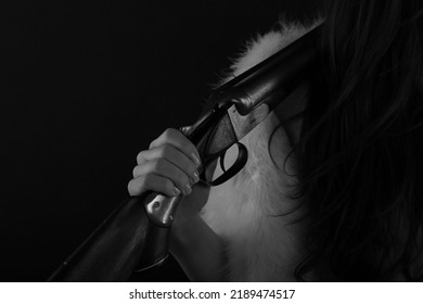 Female Hand On A Vintage Shotgun In Black And White